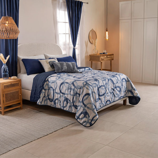 Quilt doble faz círculos azul