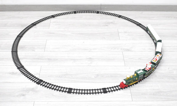 Pista con tren navideño para rodear árbol